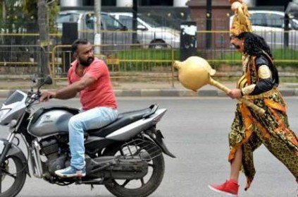 Bengaluru: Yamaraj warns motorists against violation of traffic rules.