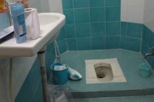 Shocking - Couple forced to live in relative's toilet for a year