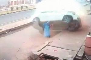 Shocking - Car flips several times and crushes old woman