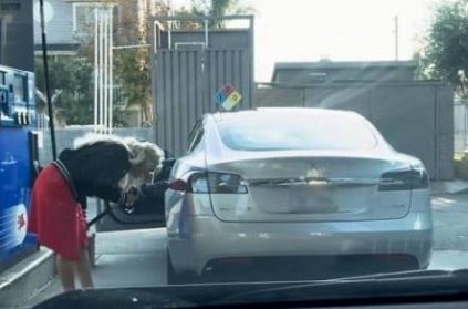 Women tries to put petrol for an electric battery car video goes viral