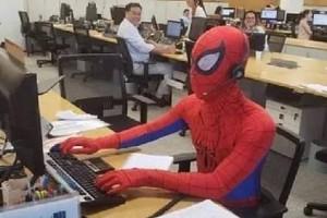 Watch - Bank employee turns up to office in Spider-man costume on last day