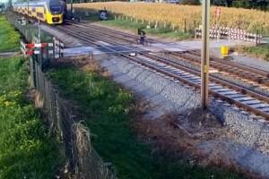 Watch - Cyclist crosses track when train approaches; Here is what happens next