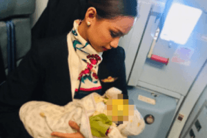 Flight Attendant Breastfeeds Passenger's Hungry Baby; Internet Hails Her As A Hero