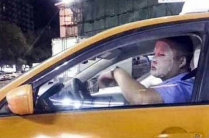 Photo of cab driver in China wearing face mask on job goes viral