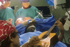 WATCH | Musician Plays Guitar While Undergoing Surgery To Remove Tumour From Brain