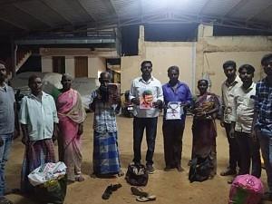 Vijay fans gift new clothes and sweets to cobbler